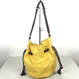 The Sak drawstring yellow leather bucket bag